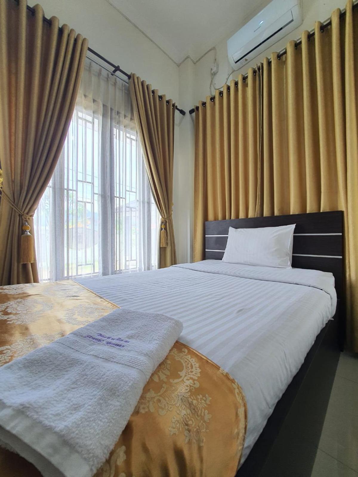 Mahakam Guest House Padang  Rum bild
